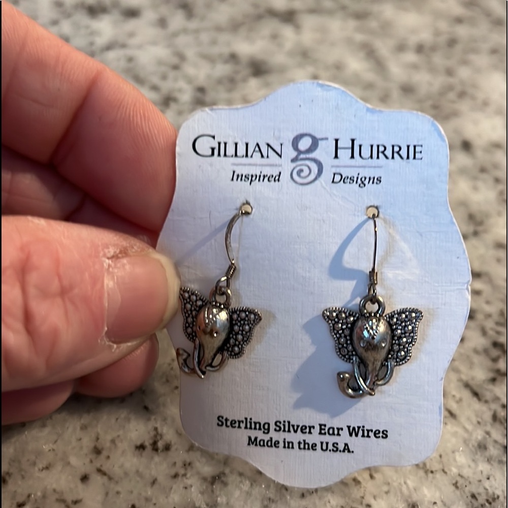 Sterling Silver elephant earrings as shown never worn on original card